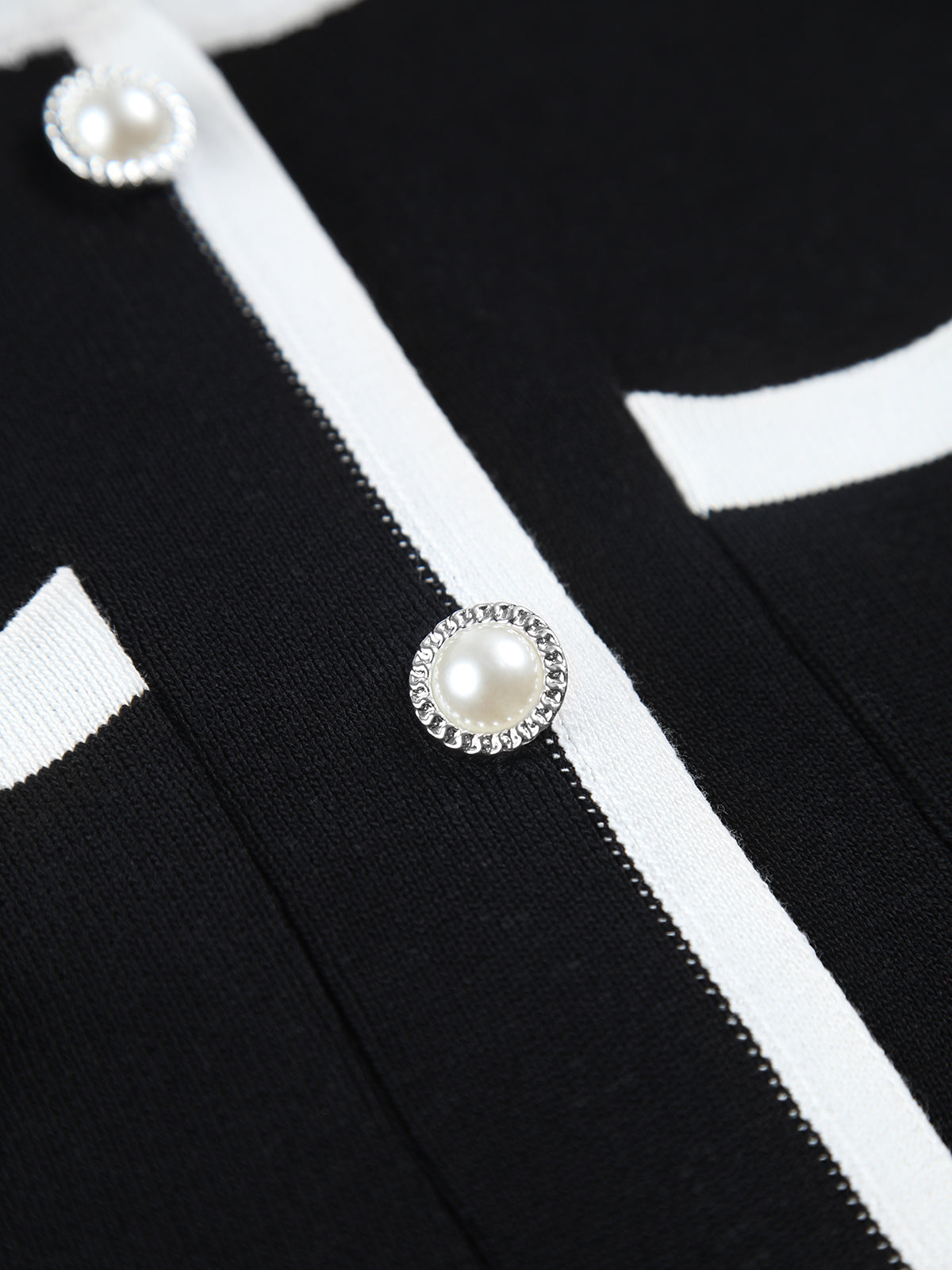 Dress in Knit — Sleeveless Pearl Button Mini with Contrast Trim for Elegant Style