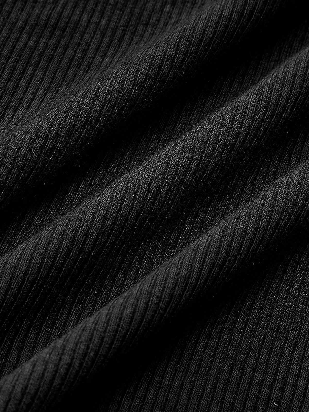 Top in Ribbed Knit — Long Sleeve Crew Neck with Exposed Seam Detail and Slim Fitted Silhouette