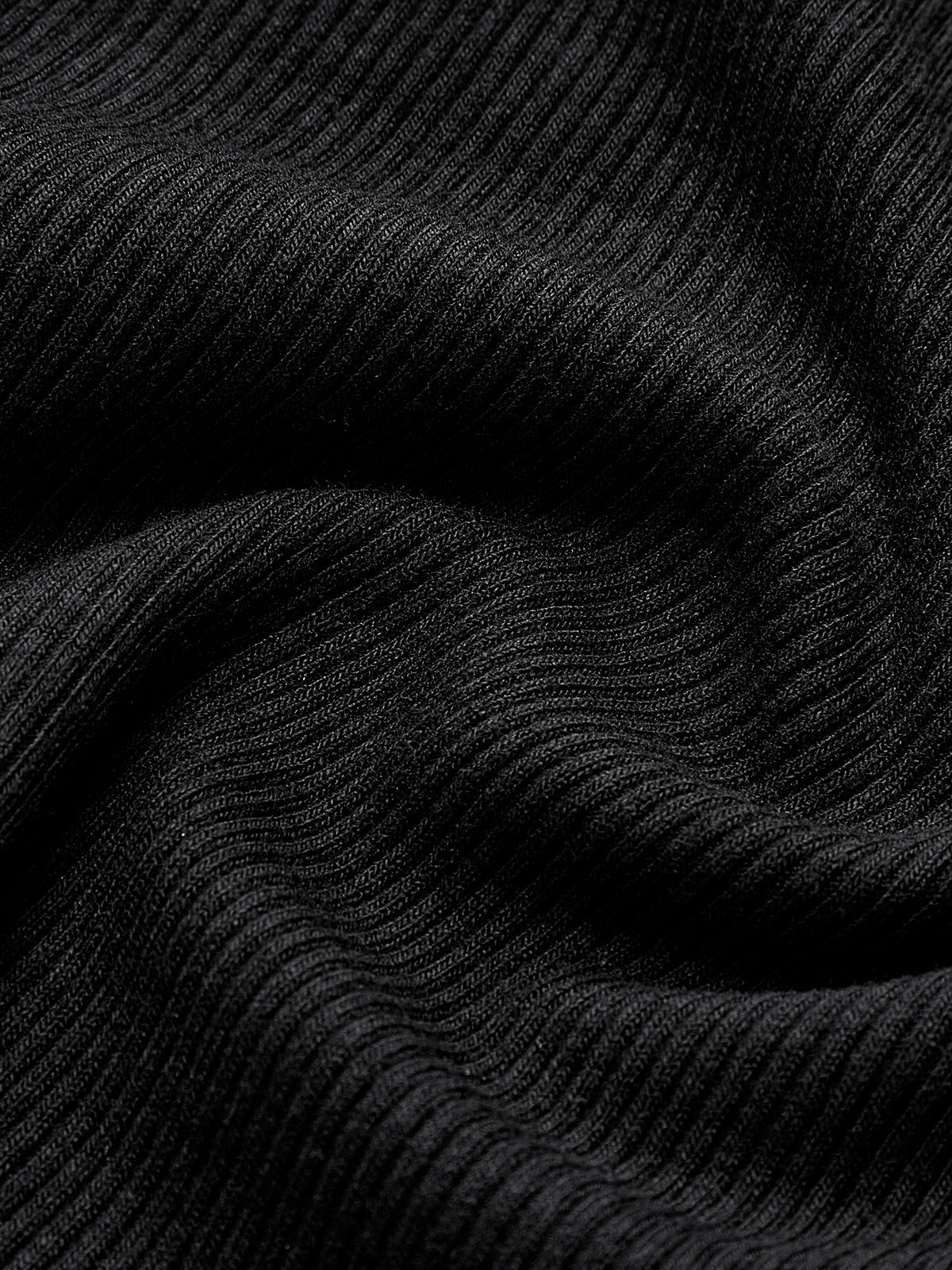 Top in Ribbed Knit — Long Sleeve Crew Neck with Exposed Seam Detail and Slim Fitted Silhouette